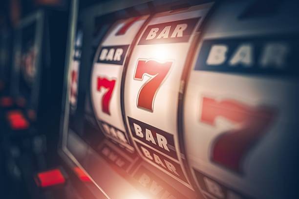 Mega Moolah reel layout showing five reels with animal symbols and progressive jackpot tiers displayed at the top of the game screen